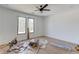 Bedroom featuring new floors and multiple windows for ample natural light at 51 Deer Canyon Dr, Auburn, GA 30011