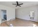 Bedroom featuring new floors and a doorway to the bathroom at 51 Deer Canyon Dr, Auburn, GA 30011