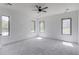 Spacious bedroom with expansive windows that showcase the serene outdoor scenery at 51 Deer Canyon Dr, Auburn, GA 30011