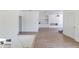 Bright, open living room with stylish floors, modern fireplace, and white trim at 51 Deer Canyon Dr, Auburn, GA 30011