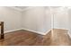 Hardwood flooring is featured in this hallway area with access to other rooms at 565 Stone Field Nw Run, Marietta, GA 30060