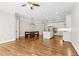 Open-concept living space connecting the kitchen, dining area, and living room at 565 Stone Field Nw Run, Marietta, GA 30060