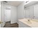 Bathroom featuring a vanity with a large mirror and a shower with a white curtain at 1100 Kensington Ct, Johns Creek, GA 30022