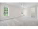 Bright bedroom with new carpet and windows at 1100 Kensington Ct, Johns Creek, GA 30022