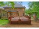 Spacious wooden deck with railing, perfect for outdoor entertaining and enjoying the serene backyard at 1100 Kensington Ct, Johns Creek, GA 30022
