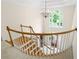 Bright foyer with hardwood stairs, chandelier, and large window, creating an inviting entrance at 1100 Kensington Ct, Johns Creek, GA 30022