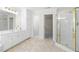 Functional bathroom featuring a shower and lots of cabinet space at 1100 Kensington Ct, Johns Creek, GA 30022