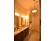 Elegant main bathroom features dual sinks, granite counters, and a soaking tub at 15 Worthington Dr, Villa Rica, GA 30180