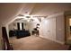 Large bedroom featuring neutral walls, carpet floor, ceiling fan, closet doors, and a bed with black bedding at 15 Worthington Dr, Villa Rica, GA 30180
