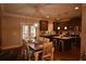 Bright kitchen with stainless appliances, granite counters, and a breakfast nook by French doors at 15 Worthington Dr, Villa Rica, GA 30180