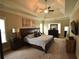 Spacious main bedroom with tray ceiling, neutral tones, and ample natural light at 15 Worthington Dr, Villa Rica, GA 30180
