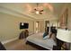 Large main bedroom features tray ceilings, calm colors and substantial square footage at 15 Worthington Dr, Villa Rica, GA 30180
