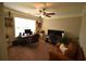 Bright office space with two computer desks, ample light, and an area for relaxing at 15 Worthington Dr, Villa Rica, GA 30180