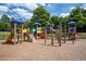 Community playground featuring colorful play structures, slides, climbing areas, and a wood chip ground at 15 Worthington Dr, Villa Rica, GA 30180
