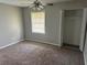 Comfortable bedroom with carpet, ample closet space, and natural light at 1685 Pheasant Dr, Jonesboro, GA 30238