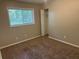 Comfortable bedroom with carpet flooring, closet storage, and a bright window at 1685 Pheasant Dr, Jonesboro, GA 30238
