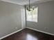 Cozy dining room with hardwood floors, natural light, and closet storage at 1685 Pheasant Dr, Jonesboro, GA 30238