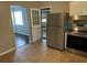 Kitchen area featuring stainless steel refrigerator and stove at 1685 Pheasant Dr, Jonesboro, GA 30238
