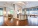 Open common room area with hardwood floors and lots of natural light coming through large windows at 3040 Peachtree Nw Rd # 815, Atlanta, GA 30305