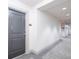 Hallway leading to unit, showcasing well-maintained interiors and neutral color palette at 3040 Peachtree Nw Rd # 815, Atlanta, GA 30305