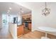 Open kitchen features wood cabinets, stainless steel appliances, and a large island at 3040 Peachtree Nw Rd # 815, Atlanta, GA 30305