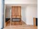 Cozy room features an electric fireplace, light hardwood floors and recessed lighting at 3040 Peachtree Nw Rd # 815, Atlanta, GA 30305