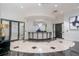 Elegant lobby with chandelier, concierge desk, and stylish decor at 3040 Peachtree Nw Rd # 815, Atlanta, GA 30305