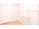 Walk-in closet featuring built-in shelving for ample storage and organization at 3040 Peachtree Nw Rd # 815, Atlanta, GA 30305