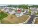 Aerial view of a two-story home nestled in a vibrant, green neighborhood at 3135 Ellenton Dr, Lithia Springs, GA 30122
