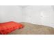 Simple carpeted bedroom featuring a comfortable bed and neutral tones at 3135 Ellenton Dr, Lithia Springs, GA 30122