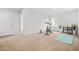 This exercise room has carpet floors, natural light from the window, and workout equipment at 3135 Ellenton Dr, Lithia Springs, GA 30122