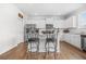 Bright kitchen features stainless appliances, white cabinetry, and central island at 3135 Ellenton Dr, Lithia Springs, GA 30122
