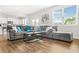 Cozy living room with natural light and open floor plan to the kitchen at 3135 Ellenton Dr, Lithia Springs, GA 30122