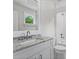 Bathroom featuring a granite countertop vanity and tiled shower/tub at 340 Colewood Way, Atlanta, GA 30328