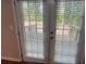 Double doors lead to backyard deck area, offering easy outdoor access at 3948 Valley Brook Rd, Snellville, GA 30039