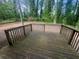 Wooden backyard deck with natural wooded scenery at 3948 Valley Brook Rd, Snellville, GA 30039