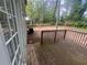 Wooden backyard deck with wooded view at 3948 Valley Brook Rd, Snellville, GA 30039