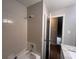 Standard bathroom featuring shower and bathtub combination at 3948 Valley Brook Rd, Snellville, GA 30039