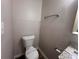 Cozy bathroom with toilet and towel bar at 3948 Valley Brook Rd, Snellville, GA 30039