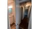 Hallway view with bathroom to the left at 3948 Valley Brook Rd, Snellville, GA 30039