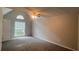 Bedroom with a ceiling fan and large window at 3948 Valley Brook Rd, Snellville, GA 30039