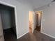 Carpeted bedroom with access to multiple closets at 3948 Valley Brook Rd, Snellville, GA 30039