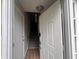 A view through the front door shows a hallway and stairs with neutral colors at 3948 Valley Brook Rd, Snellville, GA 30039