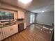 Well-lit kitchen with stainless steel appliances, and ample countertop space at 3948 Valley Brook Rd, Snellville, GA 30039