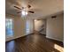Bright living room features large windows and hardwood floors at 3948 Valley Brook Rd, Snellville, GA 30039