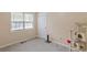 Bedroom featuring a window with blinds, a cat tree and carpeted flooring at 401 Farm Brook Ln, Dallas, GA 30157