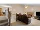 Cozy living room featuring a fireplace and ample seating at 401 Farm Brook Ln, Dallas, GA 30157