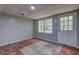 Bright basement features neutral walls and tile floors at 5621 Wildwood Trl, Lithonia, GA 30038