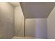 Unfinished basement corner featuring painted walls, concrete floor, and visible utilities at 5621 Wildwood Trl, Lithonia, GA 30038