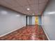 Finished basement area with recessed lighting, tiled floor, and access to closet and additional room at 5621 Wildwood Trl, Lithonia, GA 30038